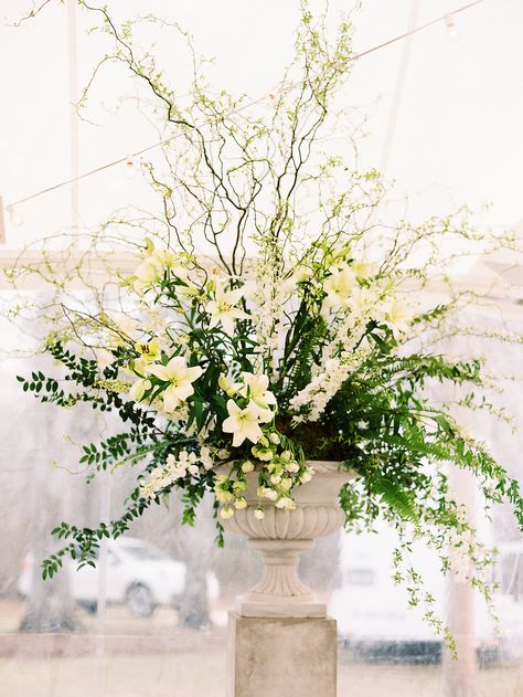 Large white and green floral arrangement #whitelily #curlywillow #greenery Large White Floral Arrangements, Tall White Floral Arrangements, Green And White Alter Flowers, White Lily Arrangement, Large White Rose Arrangement, White Wedding Arrangements, Large White And Green Floral Arrangement, Tall Floral Arrangements, Urn Arrangements