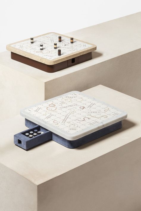 Giobagnara Delos Marble Snakes & Ladders Game Set | Leather-Covered Wood Structure with Marble Top and Printed Leather Playing Field | Metal Playing Pieces in Three Finishes with Fine Leather Inserts | Removable Drawer for Convenient Storage | Luxurious and Stylish Entertainment | Explore a Range of Luxury Board Games, Classic Games, and Gift Games at 2Jour Concierge, #1 luxury high-end gift & lifestyle shop Unique Board Games, Game Board Design, Boardgame Design, Ladders Game, Playing Board Games, Goods Design, Family Board Game, Wooden Board Games, Designer Board