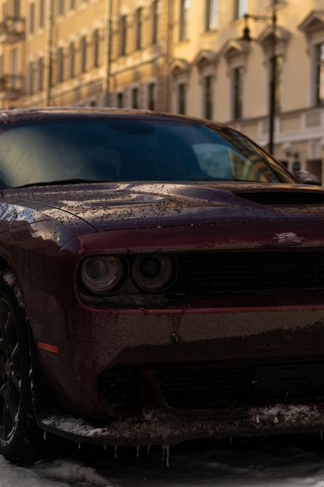 Dark red Dodge Challenger with icicles parked on the side of the street in the city in the snow Dark Red Car, Red Dodge Challenger, Dodge Muscle Cars, Red Car, Dodge Challenger, Close Up Photos, Car Parking, The Snow, Dark Red