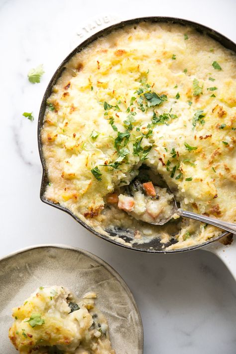 This fish pie recipe is inspired by Jamie Oliver but made easy, healthy, dairy-free, gluten-free and low FODMAP. It’s packed with veggies and hake, haddock or cod. | www.feedmephoebe.com Dairy Free Fish Pie, Fish Pie Recipe, Frozen Fish Fillets, Rabbit Recipes, Witch Recipes, Gf Meals, Fodmap Foods, Gluten Free Fish, Irish Cuisine