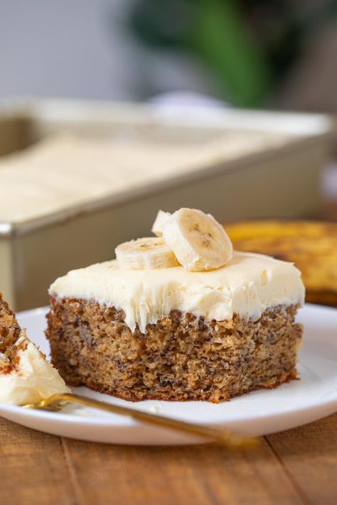 Easy Easy Banana Cake Recipe (w/ Cream Cheese Frosting) - Dinner, then Dessert Banana Cake Icing, Sour Cream Recipes Easy, Sugar Free Banana Cake, Banana Sour Cream Cake, Banana Nut Cake, Banana Cake Recipe Easy, Recipes Using Bananas, Cake Frosting Recipe, Sour Cream Cake