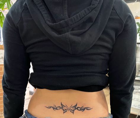 Taco Bell Tramp Stamp, Spine Tattoo Into Tramp Stamp, Stamp Tamp Tattoo, 2000s Lower Back Tattoo, Tramp Stamp Ideas Black Women, Trap Stamp Tattoos Aesthetic, Zodiac Tramp Stamp, Hot Lower Back Tattoos For Women, Backstamp Tattoo