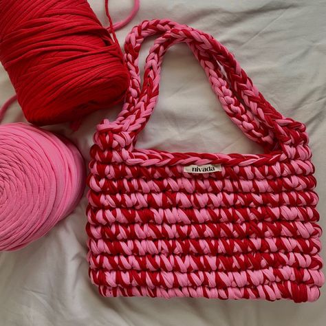 Want to make a statement without saying a word? Carry one of our hand-crafted bags made from upcycled materials. Each piece is unique, just like you. Grab yours now before they're gone, because once they're out of stock, you'll be stuck admiring them from someone else's feed. Free shipping from Indonesia. #crochet #fashion #crochetbagpattern #sustainable Crochet With T Shirt Yarn, Tshirt Yarn Bag Crochet Pattern, Crochet Big Bag, Crochet T Shirt Yarn, Yarn Bag Tutorial, T Shirt Yarn Crochet, Crochet Pouches, Crochet Bag Tutorial, Yarn Tote Bag