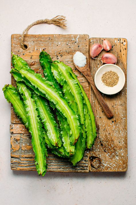 Learn how to cook winged beans aka dragons beans! It's crunchy, garlicky, and perfectly seasoned! Serve as a side with steamed white rice, tofu, tempeh, etc! #beans #vegan #plantbased #side Wing Beans Recipe, How To Cook Garlic, Rice Tofu, Winged Bean, Garlic Wings, Steamed White Rice, Bean Pods, Garlic Uses, Garlic Fries