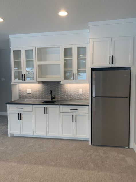 Kitchenette Cabinet Ideas, Bonus Room Kitchenette Ideas, Basement Dry Bar With Full Size Fridge, Small Basement Kitchen With Island, White Kitchenette Ideas, Basement Full Kitchen Ideas, L Shaped Kitchenette Basement, Basement Corner Kitchenette, Kitchenette With Laundry