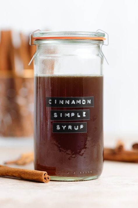 This Cinnamon Simple Syrup takes less than 30 minutes to make and calls for only 4 ingredients! It's such a delicious homemade syrup and it has a ton of uses! You can use this syrup in coffee, lattes, cocktails, mocktails, or you can even drizzle it over pancakes! It's totally fool-proof and freezer-friendly! Homemade Coffee Syrup Recipes, Cinnamon Syrup Recipe, Vanilla Syrup For Coffee, Homemade Coffee Syrup, Thyme Simple Syrup, Baked Apple Oatmeal, Homemade Latte, Coffee Lattes, Cinnamon Simple Syrup