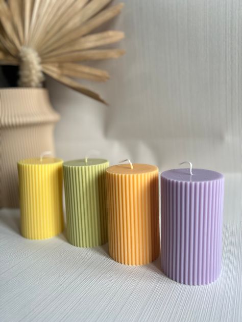 Small Thick Ribbed Candles, are aesthetic candles designed for decorative purposes. Elegant and unique. Our candles are perfect for decorating your space or for a gift, they complement a variety of decorative styles and have a timeless elegance. ATTENTION, Our pillar candles are for ornament purposes, however, if you wish to lit them do not burn them for more than 4 hours at a time. If you decide to burn our candles please place them on a tray or a dish. Do not light the candle on the table clot Colorful Pillar Candles, Ribbed Candles, Candles Packaging, Candle Products, Handmade Candles Diy, Pastel Candle, Candle Crafts, Candle Wedding Gift, Homemade Scented Candles