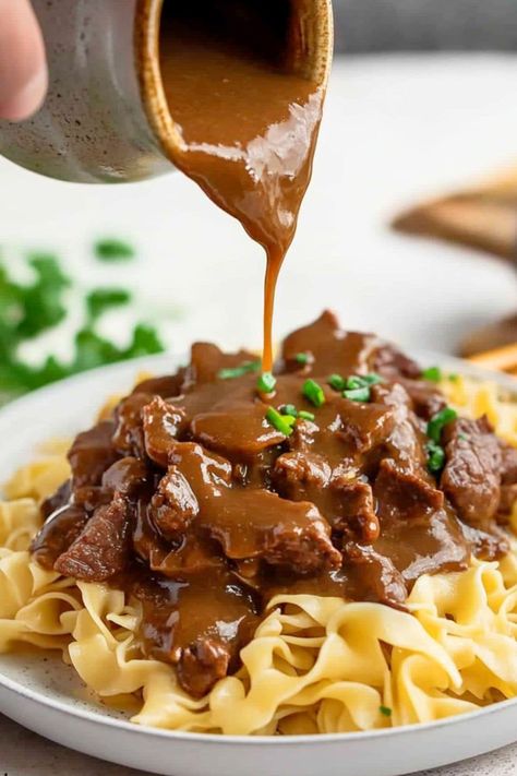 Beef tips and noodles is a budget-friendly weeknight hero! Featuring tender beef, savory gravy, and buttery egg noodles, it’s the perfect family-friendly dinner. Easy Pork Dinners, Weeknight Beef Dinners, Beef Stew Meat And Noodles, Egg Noodles And Beef, Canned Beef Recipe Ideas, Recipes For Beef Tips, Egg Noodles And Beef Tips, Beef Chuck Tender Steak Recipes, Stew Meat And Egg Noodles