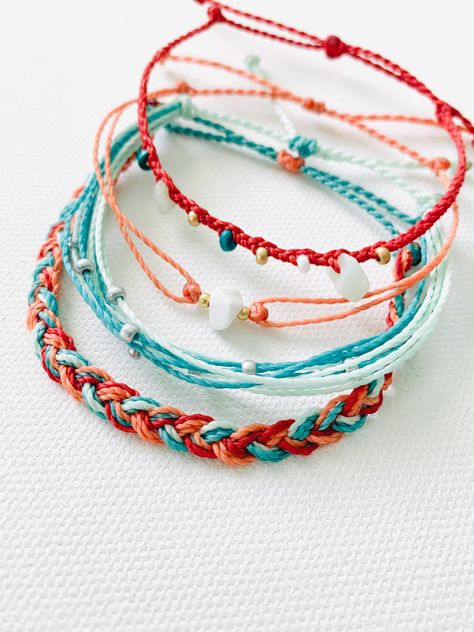 These fun bracelets are waterproof and great for anyone who is often doing outdoor activities. They would make a nice gift. Stack these together, with other bracelets, or wear them by themselves! They are perfect for everyday wear! ∙ ∙ ∙ ∙ ∙ ∙ ∙ ∙ ∙ ∙ ∙ ∙ ◆ PLEASE NOTE ◆ When you first receive these bracelets they may be slightly sticky, which may make them more difficult to adjust. The stickiness does not last. After a day or two of wearing the stickiness will fade and it will be much easier to Diy Pura Vida Bracelets, Handmade Waxed Cord Friendship Bracelets For Beach, Adjustable Colorful Beach Bracelets, Trendy Beach Friendship Bracelets With Waxed Cord, Summer Beach Resizable Braided Bracelets, Bracelet Photography, String Bracelets, Hand-strung Waxed Cord Beach Bracelets, Beachy Bracelets