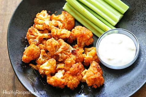 An easy recipe for keto buffalo cauliflower made with no flour and served with a blue cheese dressing and celery. Keto Buffalo Cauliflower, Buffalo Cauliflower Wings, Baked Buffalo Cauliflower, Keto Casseroles, Cauliflower Buffalo Wings, Healthy Flour, Cauliflower Wings, Easy Cauliflower, Flavorful Vegetables