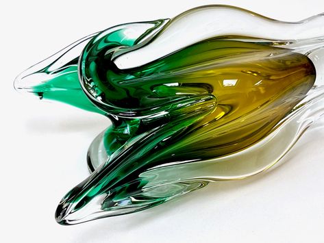 An incredible example of beautiful art glass, made in Chřibská, Czechoslovakia.Measuring 23.5cm tall, 13cm wide and .5cm deep, this beautiful piece certainly has a wow factor to it.This particular piece - in its stunning emerald green and amber combination - was made by Sklarna Chřibská (aka Chřibská Glassworks) in Czechoslovakia.This model was designed by head designer Josef Hospodka in the 1960s.It's in excellent vintage condition with no chips, cracks or major scratches to mention. Josef Hospodka, Vintage Art Glass, Art Glass Vase, Vase Design, Wow Factor, Emerald Green, Art Glass, Beautiful Art, D Art