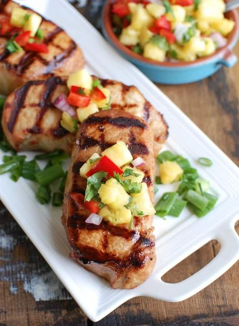 Grilled Hawaiian Pork Chops make a flavorful and easy summer meal that the whole family will love. Pork chops are marinated in a Hawaiian sauce, grilled to perfection and topped with a sweet pineapple salsa. // A Cedar Spoon #ohpork #ad Hawaiian Bbq Pork, Hawaiian Sauce, Pork Chops Grilled, Hawaiian Pork Chops, Easy Summer Meal, Hawaiian Pork, Recipes For Camping, Best Pork Recipes, Best Pork Recipe