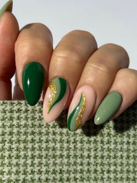 st. Patrick's day nails: dark green almond nails with swirls St Patrick S Day Nails, Black St Patricks Day Nails, Saint Patrick’s Day Nails Almond, St Paddy’s Day Nails, Subtle St Patricks Day Nails, Ireland Nails, Pedicure Nail Ideas, St Patricks Nails, St Patricks Day Nails Design