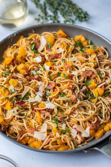 Our butternut squash pasta is a savory dish with a touch of sweetness thanks to a little brown sugar. It's a fall-inspired spaghetti made with tender chunks of butternut squash, crispy bacon, Pecorino cheese, Parmesan cheese, and fresh herbs. Everything is brought together with plenty of butter, cinnamon, nutmeg, and fresh thyme. #butternutsquashpasta #fallrecipes #pasta Pasta Rasta, Creamy Chicken Carbonara, Butternut Squash Recipes Pasta, Squash Pasta Recipe, Coconut Curry Chicken Recipes, Chicken Carbonara Recipe, Curry Chicken And Rice, Butternut Squash Pasta, Butter Cinnamon