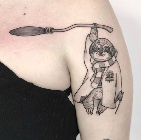 Sloth Harry Potter tattooed on the shoulder done by @heidikayetattoo | www.otziapp.com Sloths Tattoo, Sloth Finger Tattoo, Tiny Sloth Tattoo, Sloth Tattoo Design, Sloth Tattoos Men, Sloth Family Tattoo, American Traditional Sloth Tattoo, Sloth Skeleton Tattoo, Sloth Drawing