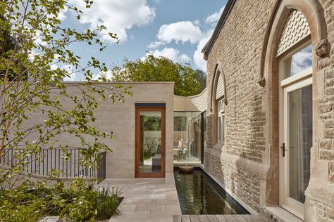 Simon Gill Architects creates The Lodge house in London cemetery British Houses, Lodge House, Highgate Cemetery, Purbeck Stone, Terracotta Roof, House In London, Modern Extension, Stone Facade, Landscape Elements