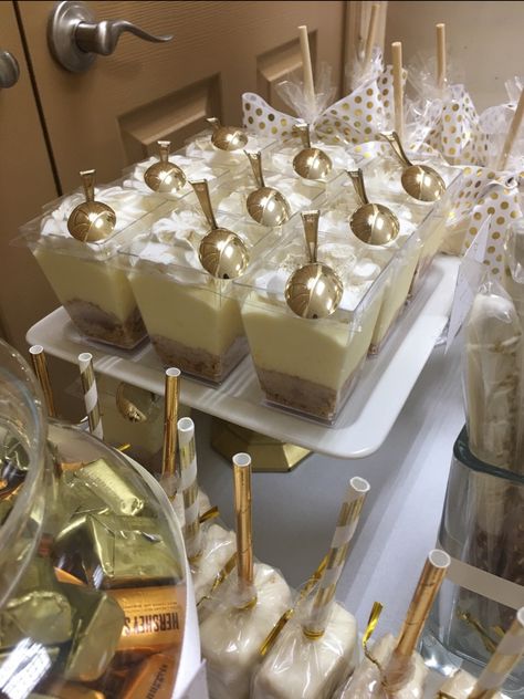 Prom Desert Table Ideas, White And Gold Party Favors, Gold And White Treats, White Gold Quinceanera Theme, White And Gold Candy Table, White And Gold Quinceanera Decorations, White And Gold Desserts, White Gold Party Theme, Gold And White Graduation Party Ideas