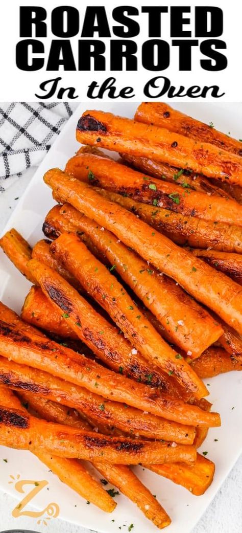 This recipe for oven roasted carrots is an easy and delicious way to get healthy veggies into your diet! Peel carrots and slice into even-sized pieces, then coat in oil, salt, and pepper, and roast until tender, glazed, and slightly browned. Roasted carrots in the oven are delicious nestled on a plate with chicken, beef, pork, or pot roast. Cook them with potatoes, onions, and broccoli for extra flavor. #ovenroastedcarrots #ourzestylife # roastedcarrotsintheoven #roastedcarrotsrecipe Roasted Carrots With Cinnamon, Roasted Carrots And Peppers, Carrots In The Oven Recipes, Oven Roasted Peppers And Onions, Roasted Carrots And Potatoes, Roasted Whole Carrots, Recipes Supper, Carrots In Oven, Carrot Recipes Side Dishes