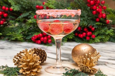 8 Hallmark-Inspired Cocktails For Toasting The End Of Christmas Movie Season Elf Movie Themed Cocktails, Christmas Movie Themed Cocktails, Christmas Sparkler Drink, Holiday Party Food Display, Holiday Champagne Cocktails, Sparkling Wine Christmas Cocktail, Pop Rocks Candy, Hallmark Christmas Movies 2022, Holiday Christmas Party