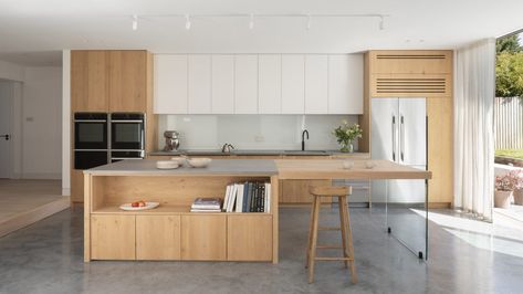 A hipped roof covered in tiles tops this extension to a home on a suburban estate in Epsom, Surrey, designed by London-based studio Oliver Leech Architects. Kitchen Concrete Floor, Glass Tears, Dezeen Architecture, Concrete Kitchen Floor, Polished Concrete Kitchen, Surrey House, Hipped Roof, Open Plan Apartment, Larch Cladding