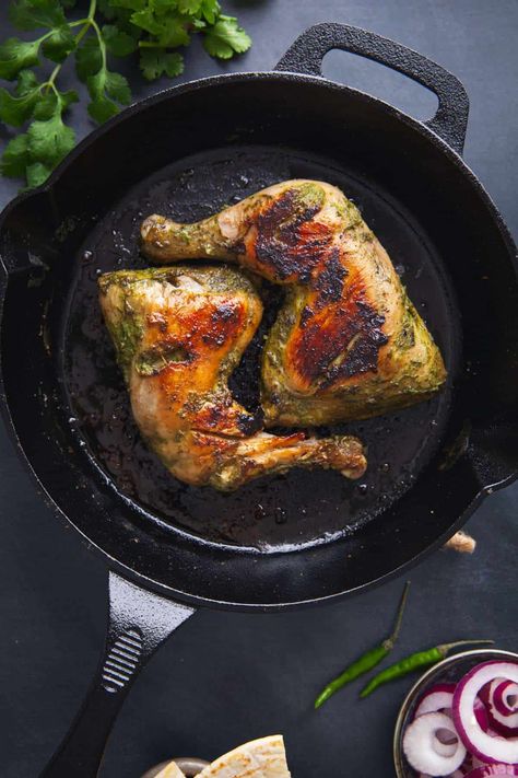 Hayali chicken placed in a cast iron skillet. Tandoori Roti, Tikka Recipe, Green Garlic, Chicken Masala, Green Chutney, Chaat Masala, Chicken Tikka, Chicken Marinades, Boneless Chicken