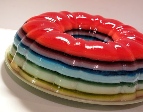 I totally want to make this with vodka in it. Am I too old for a vodka jello mold? Jello Shot Cake, Rainbow Jello Shots, Tina Colada, Rainbow Jello, Layered Jello, Kristina Webb, Jello Cake, Jello Shot, Jello Mold