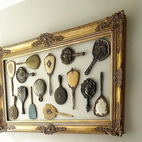 The Early Bird ~ Stacey & Kevin on Instagram: "I’ve collected vintage hand mirrors for a while. I’m drawn to the ornate character on these beauties.  Each one is so unique, and I feel they add a bit of glamor to a space. I’ve hung them in different locations in our home in various arrangements. Our master bathroom wall is my latest spot.  I thought this large vintage frame would be a fun way to display them, but my hand mirror collection was a tad too large for all of them to fit inside. So, I’ Wall Of Hand Mirrors, Antique Hand Mirror Wall, Vintage Hand Mirror Display, Antique Bathroom Wall Decor, Vintage Oval Frame Ideas Decor, Hand Mirrors On Wall, Hand Mirror Decorating Ideas, Vintage Mirror Diy, Hand Mirror Wall