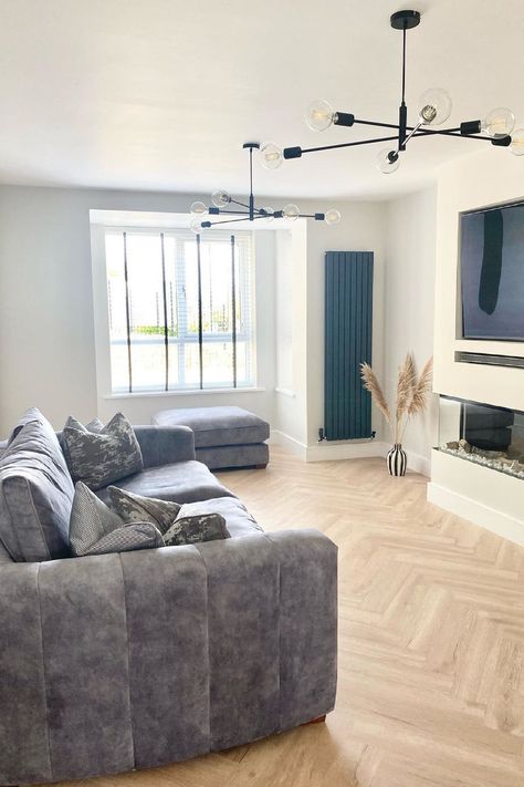 Living room with light wood effect laminate herringbone flooring and light beige painted walls Living Room Herringbone Floor, Herringbone Floor Living Room, Herringbone Floors, Black Ceiling Lighting, Oak Laminate Flooring, Oak Laminate, Living Room Goals, Flooring Inspiration, Herringbone Floor