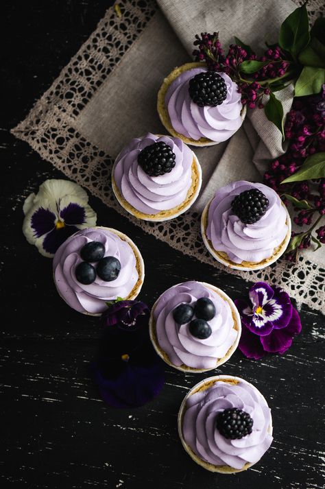 Lavender cupcakes with blueberries and blackberries and pansies Cupcakes With Lavender Flowers, Cupcakes With Blueberries, Navy Cupcakes, Lavender Cupcakes, Wedding Cake Navy, Black Cupcakes, Flower Cupcakes, Wedding 2024, Lavender Wedding