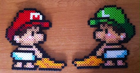 Baby Mario and Luigi perlers Perler Pins, Mario Sprites, Hama Mario, Perler Bead Mario, Mario Y Luigi, Modele Pixel Art, Geometric Tattoo Arm, Pearl Beads Pattern, Easy Perler Beads Ideas