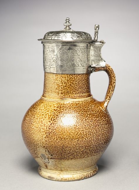 Tigerware Jug, c. 1570-1573 Germany (jug) and England (mounts), 16th century stoneware with silver mount, Diameter of base: 22.20 x 8.40 cm Folk Pottery, German Beer Steins, Coats Of Arms, Surface Decoration, Cleveland Museum Of Art, Work Room, Antique Ceramics, Beer Mugs, Orange Peel