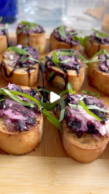 Erin Norcross| Recipe Developer & Tester on Instagram: "🫐BLUEBERRY GOAT CHEESE & BASIL CROSTINI🫐 This is your sign to run to Trader Joe’s and pick up the Blueberry Vanilla goat cheese! With its generous coating of sweet blueberries and hint of vanilla flavor it could seriously be dessert. Looks stunning on a cheese board and tastes amazing crumbled over a salad with pistachios and bacon…but today it’s all about the crostini! This is the kind of appetizer you can throw together in 15 minutes and impress your guests because it is THAT good. What’s YOUR favorite way to use this goat cheese?   💁🏻‍♀️Follow @erin_funfoodie for more easy recipe ideas, Trader Joe’s hauls, & more foodie fun!   INGREDIENTS✅ (measure with your 🩷) French Baguette Garlic Flavored Olive Oil Salt & Pepper Blueberry Blueberry Vanilla Goat Cheese, Salad With Pistachios, Blueberry Goat Cheese, Easy Recipe Ideas, Recipe Developer, Flavored Olive Oil, French Baguette, Vanilla Flavor, Trader Joe’s