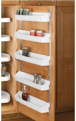 Simplify Your Organization: Hold your spices in places on a shelf mounted on the inside of your cabinet door. Good for RVs or your kitchen. - rugged life Pantry Lazy Susan, Rv Living Organization, Camper Organization, Rv Organization, Camper Storage, Rv Kitchen, Rev A Shelf, Camping Stuff, Rv Storage