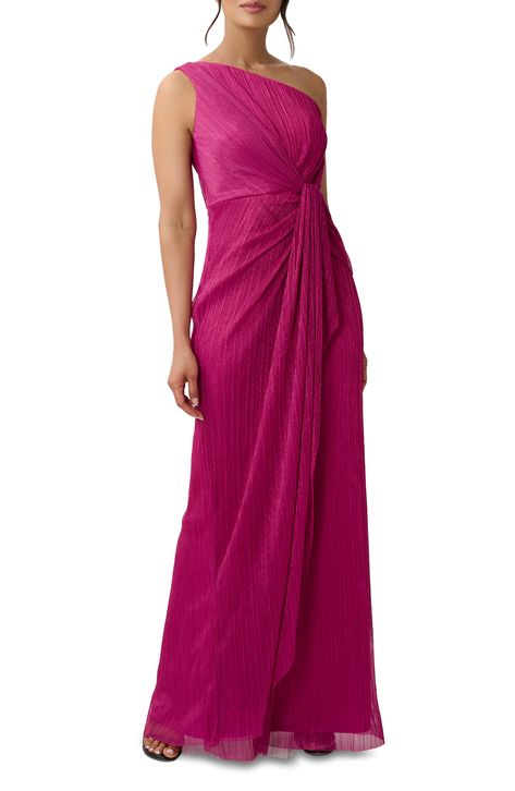 Metallic thread shimmers and shines on an elegant evening gown with a sleek one-shoulder neck and a flattering silhouette that's gathered at the waist. 62" length (size 8) One-shoulder neck Sleeveless Lined 100% polyester Dry clean Imported Petite Gowns, Asymmetrical Neckline Dress, Drape Gowns, Metallic Knit, One Shoulder Gown, Sleeveless Gown, Evening Gowns Elegant, Adrianna Papell Dresses, Review Dresses