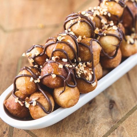 Dalia  داليا on Instagram: “Lugaimat or Awameh - which are basically Arab donut holes dipped in syrup normallly but I also love them with chocolate + hazelnuts. The…” Tasty Pastry, Middle Eastern Desserts, Dough Ingredients, Chocolate Shake, Donut Holes, Fried Dough, Cookery Books, Juicy Steak, Creamy Soup