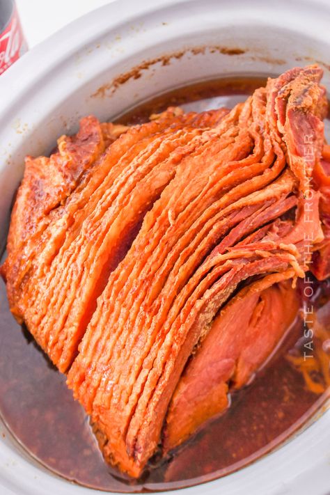 You'll love this simple and delicious Coca-Cola Ham made in either the slow cooker or the oven. It makes holiday prep so easy! Spiral Ham In Crockpot Slow Cooker With Coke, Crockpot Ham With Dr Pepper, Coke Ham Crockpot, Coca Cola Ham Crockpot, Crockpot Ham With Coke, Dr Pepper Ham Crockpot, Ham Cooked In Coke, Ham With Coke, Dr Pepper Ham