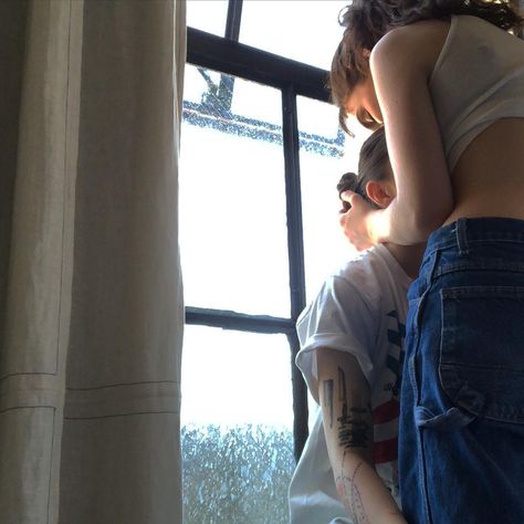 Cute lesbians hugging in front of a big industry window in down town Los Angeles Masc Lesbian Couple Aesthetic, Wlw Pictures Spicy, Mommy Gf Aesthetic, Short Masc Tall Femme Couple Wlw Aesthetic, Wlw Relationship Aesthetic Spicy, Lesbian Tattoo Aesthetic, Fem Masc Relationship, Masc Fem Couple Wlw, Masc Gf Aesthetic