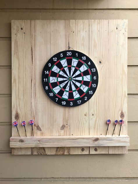 Hi All, After a lot of research I have setup this Dart Board in my open terrace. Hope you guys will like it. The back borad is made up of American Pine Wood and I’m planing to polish the board and add some accessories to it. Dart Board Wall Cork, Home Darts Room, Home Darts Setup, Diy Dart Board Backing, Dartboard Ideas, Outdoor Dart Board, Teen Game Rooms, Basement Bar Area, Darts Board