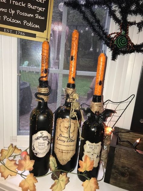 Wine anyone?! Had some more wine bottles and decided to add some scary ones to my collection! Wine Bottles Decor, Halloween Wine Bottle Crafts, Hello Kitty Wine, Sea Glass Window Art, Fall Wine Bottles, Halloween Wine Bottles, Halloween Apothecary, Glass Candles, Halloween Bottles