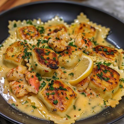 🦞 Savor the elegance of Lobster Ravioli in a Zesty Lemon Butter Sauce! #SeafoodLovers #GourmetEats Lobster Ravioli in a Zesty Lemon Butter Sauce Ingredients: Lobster ravioli (1 pack, store-bought or homemade) Butter (1/2 cup) Lemon juice (1/4 cup) Garlic (2 cloves, minced) Lemon zest (1 tsp) Fresh parsley (1/4 cup, chopped) Salt and pepper (to taste) Instructions: Cook ravioli according to package instructions, drain and set aside. In a pan, melt butter over medium heat, add garlic and sa... Lobster Tagliatelle, Lobster Ravioli, Party Hosting, Instagram Recipes, Ravioli Recipe, Twisted Recipes, Lemon Butter Sauce, Homemade Butter, Trending Recipes