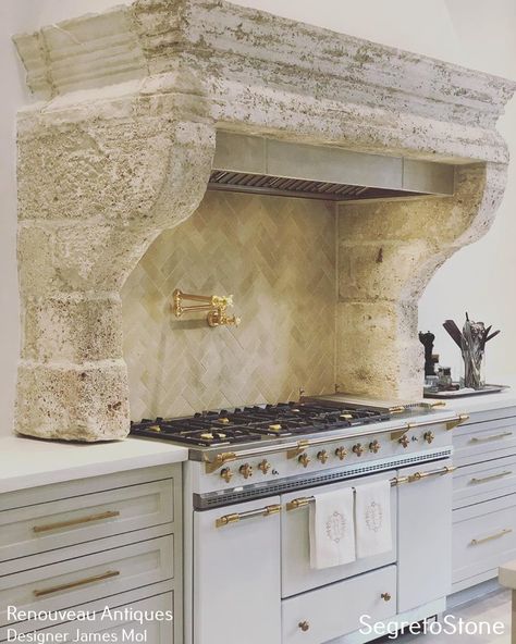 California Mediterranean Homes, Kitchen Stone Wall, Limestone Kitchen, French Mantle, Carved Stone Fireplace, Rock Steady, Stone Kitchen, Kitchen Hoods, French Country Kitchen