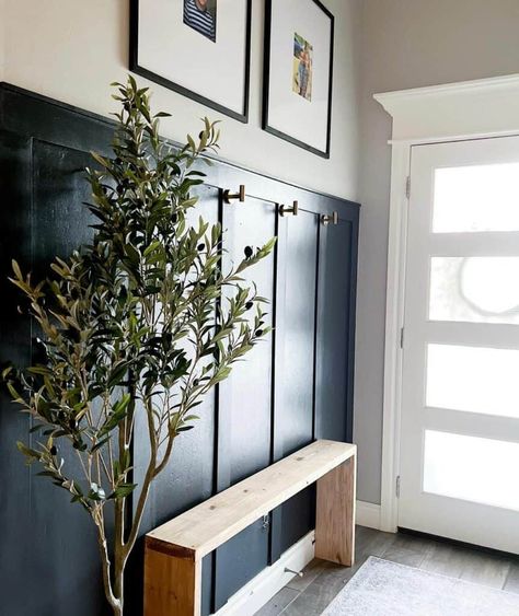 Navy Blue Entryway, Entryway Wall Ideas, Mountain Modern Living Room, Shiplap Entryway, Blue Entryway, Accent Wall Entryway, Wall Mounted Shelving Unit, Millwork Wall, Foyer Wall