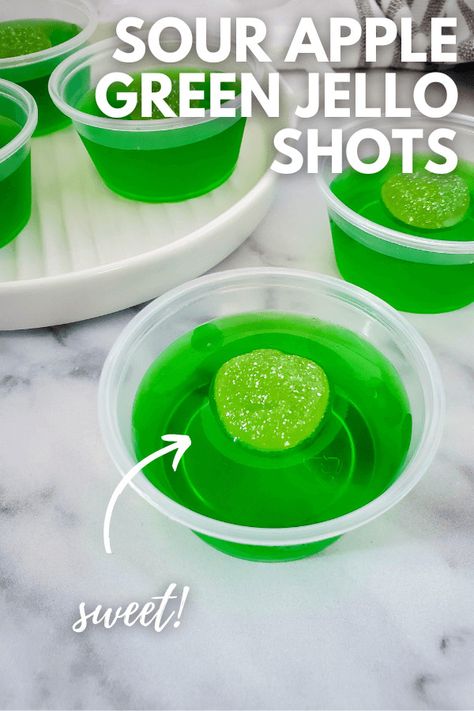 Sour Apple Green Jello Shots are a fun and vibrant way to liven up your party! These boozy treats offer a perfect combination of sweet, tangy, and sour flavors that will leave your taste buds craving more. Sour Jello Shots, Green Jello Shots, Lime Jello Shots, Tequila Jello Shots, Easy Jello Shots, Apple Shots, Sour Apple Pucker, Jello Shots Vodka, Midori Sour