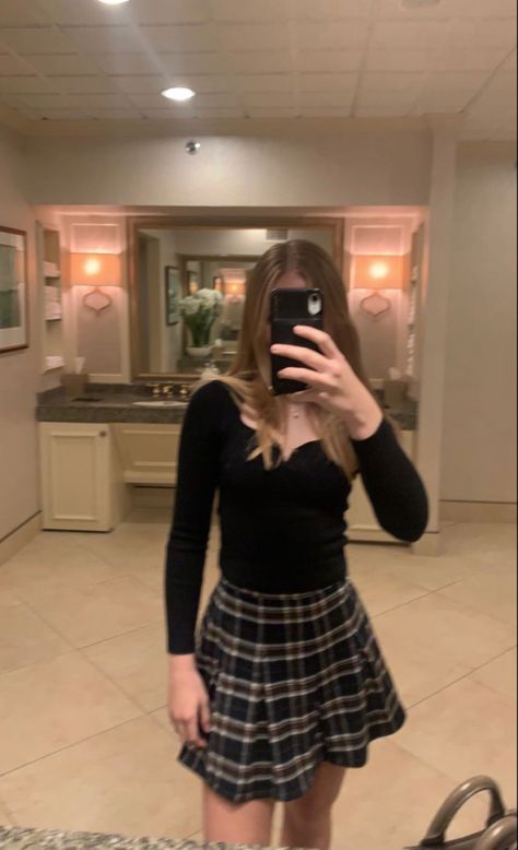 girl in mirror wearing black top with plaid pleated skirt Hollister Skirt Outfit, Winter School Plaid Mini Skirt, Hollister Babydoll Top Outfit, Brandy Melville Cara Skirt, Babydoll Sweater Hollister, Hollister Skirt, Cute Winter Outfit, Cute Winter Outfits, Skirt Outfit