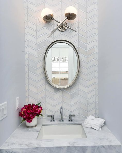 Stephanie Rapp on Instagram: “❌ marks the spot on this Powder Room design featuring herringbone tile and floating quartzite vanity.  @stephanierapp.interiors in…” Backsplash Behind Bathroom Sink, Herringbone Backsplash Bathroom, Herringbone Wall Tile, Herringbone Tile Bathroom, Vanity Backsplash, Herringbone Backsplash, Powder Room Design, Coastal Boho, Herringbone Tile