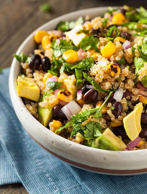 Black beans, corn, and avocado come together in a hearty southwestern quinoa salad that's good as a main dish or side. Salad With Corn And Avocado, Black Bean Salad With Corn, Bean Salad With Corn, Southwestern Quinoa, Salad With Black Beans, Salad With Corn, Black Beans And Corn, Quinoa Recipes Easy, Beans And Corn