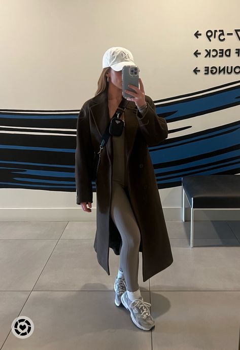 jumpsuit and coat from aritzia // hat from urban outfitters // shoes NB 530s // Prada nylon crossbody Styling Aritzia Jumpsuit, Aritzia Slouch Coat, Black Jumpsuit Aritzia, Aritzia Flared Jumpsuit, Shoes Nb, Aritzia Tna Jumpsuit, Aritzia Jumpsuit, Aritzia Outfit, Jumpsuit Winter