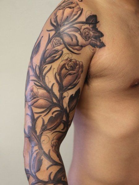 18 Memorable Rose Tattoos for Men in 2021 - The Trend Spotter Rose Outline Tattoo, Rose Vine Tattoos, Watercolor Rose Tattoos, Hunting Tattoos, Vine Tattoo, Rose Tattoo Sleeve, Filigree Tattoo, Rose Tattoos For Men, Rose Vine