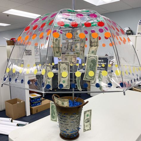 Spring Raffle Basket Ideas Fundraising, Rainy Day Basket Auction, Money Raffle Basket Ideas, Umbrella Gift Basket, Raffle Set Up Ideas, Cash Raffle Basket Ideas, Rainy Day Auction Basket Ideas, Rake In The Cash Gift Basket, Donation Gift Baskets Raffle Ideas