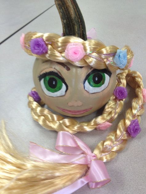 My attempt at painting this pumpkin to look like Rapunzel :-) Rapunzel Pumpkin Ideas, Rapunzel Pumpkin Painting, Rapunzel Pumpkin, Rapunzel Halloween, Storybook Pumpkin, Pumpkin Face Paint, Book Character Pumpkins, Story Book Pumpkin, Pumpkins Decor